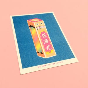 A risograph print of a box of Po Chaii Pills