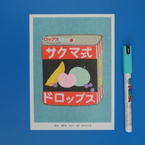 A risograph print of a tin can of Sakuma Drops