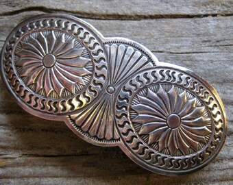 sturdy STERLING BARRETTE, Navajo artisan hand crafted exquisite concho design. Recognizable vintage quality wearable art. 3 1/4" w 2" clip.