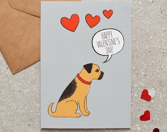 May include: A gray card with a cartoon illustration of a brown and black dog with a red collar. The dog is sitting and looking to the right. The card has red hearts and the text "Happy Valentine's Day!" in a speech bubble.