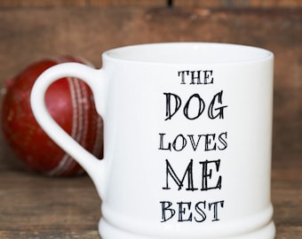 The dog loves me best mug