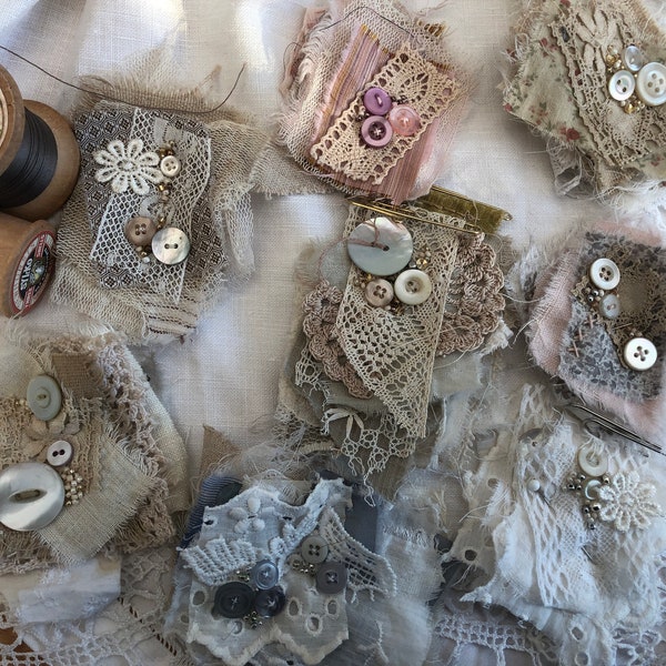 Handmade fabric cluster/snippet sets for junk journals or slow stitch projects. Embellished with vintage lace, buttons and beads.