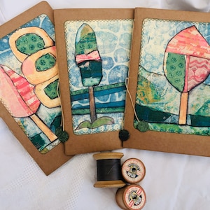 Cahier/revue vierge fait main, couverture à partir d'illustrations originales. fabriqué à partir de carton et de papier recyclés, relié à la main.