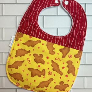 Dinosaur Nuggets Bib (fits up to 24 months)