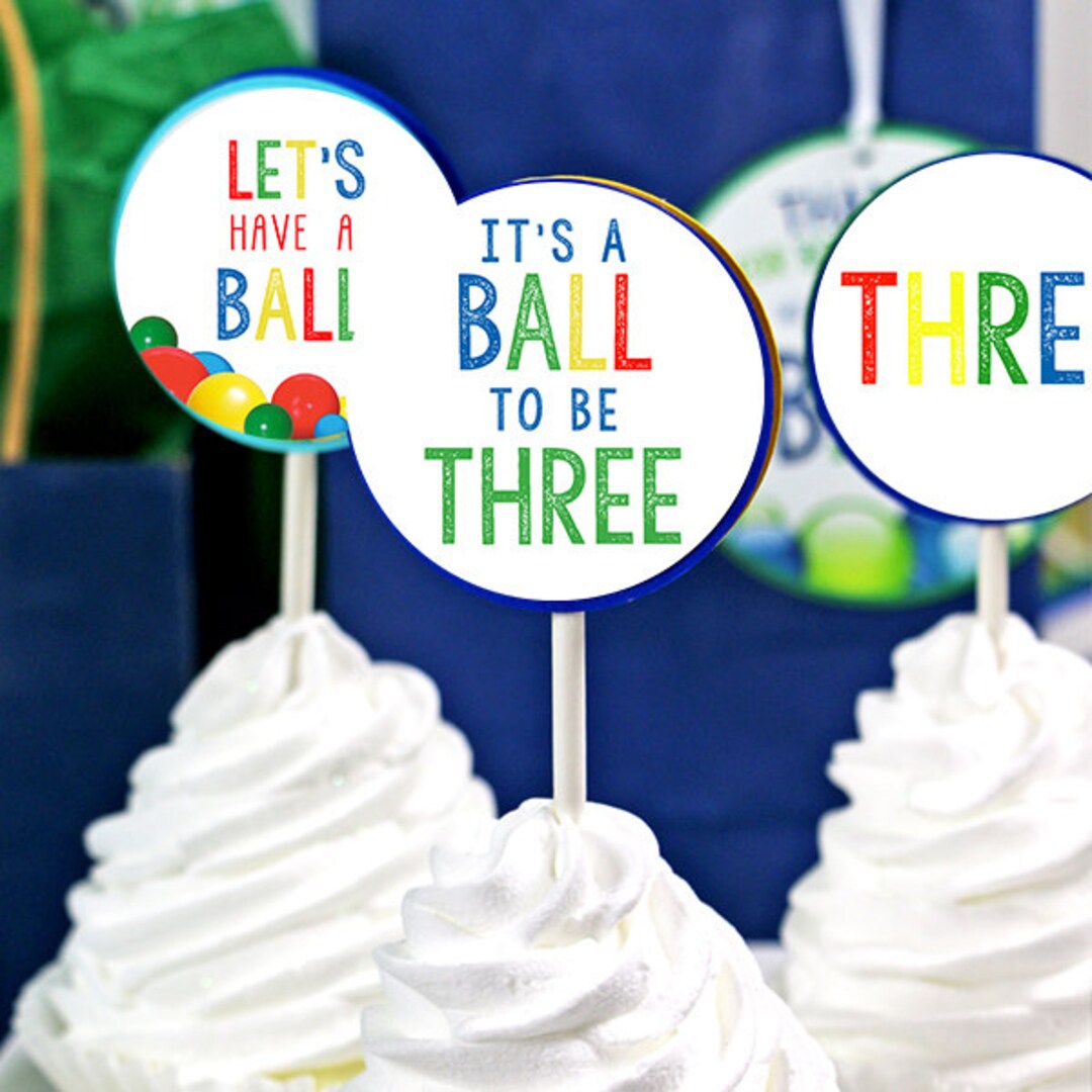 printable-it-s-a-ball-to-be-three-multicolored-ball-party-cupcake