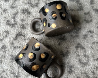 Set of 2 Leopard Print Espresso Cups on Chocolate clay