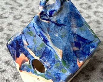 Speckled traditional Bird House