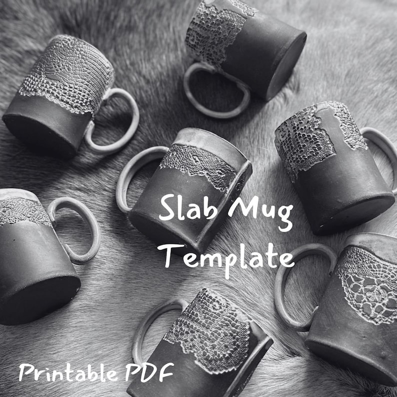 May include: Six black ceramic mugs with a lace-like design. The mugs are arranged on a fuzzy surface. The text "Slab Mug Template Printable PDF" is written in white on a black background.