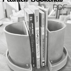 May include: A gray planter-style bookend with a curved design, holding several books. The books include titles like "Star Wars Episode IV: A New Hope" and "Bad Kitty: Puppy's Big Day." The text "Planter Bookends" and "PDF" are visible.
