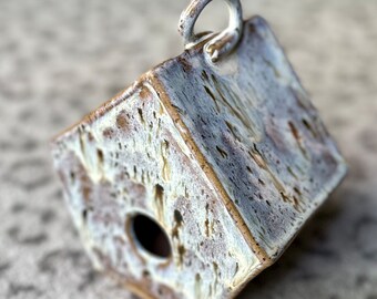 Speckled traditional Bird House