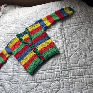 Child’s rainbow cardigan 5/6 Hand Crocheted with Wood buttons