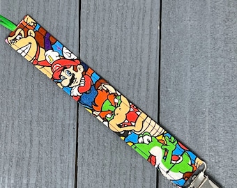 Clip para chupete de Nintendo / Porta chupete de Super Mario Brothers