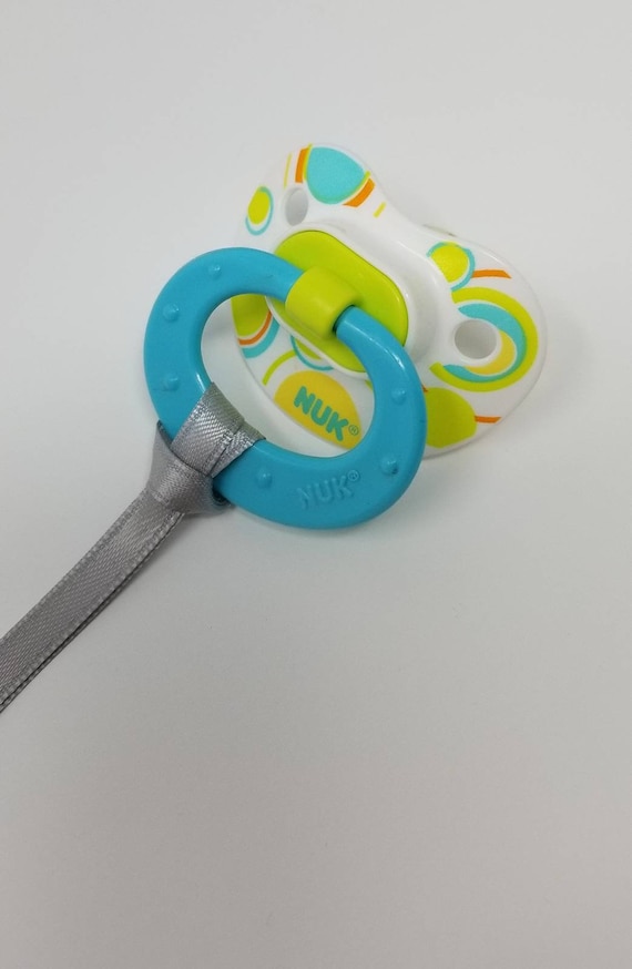 CURIOUS GEORGE PACIFIER HOLDER CLIP