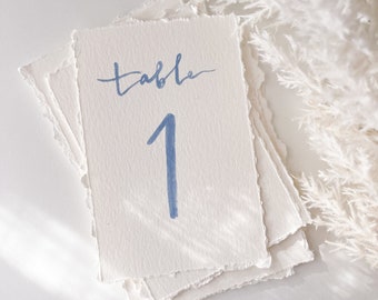 custom table numbers, hand torn deckled edge table numbers, hand painted table numbers on textured paper, watercolor table numbers