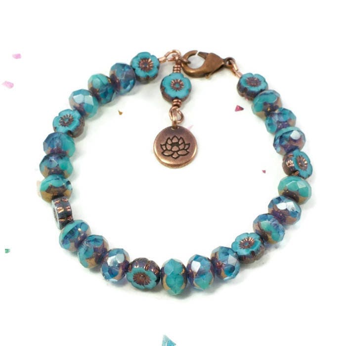 https://www.etsy.com/listing/523634338/yoga-lotus-bracelet-for-her-lotus