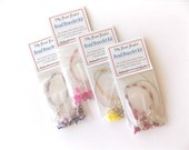 Girl's bead bracelet kits (pink, purple, yellow, red)