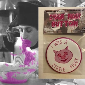May include: A pink and white button with the text "I was a Ziggie Piggy" and a cartoon pig face. The button is on a white background with a pink border. The text "Ziggie Piggy Button" is visible in the background.