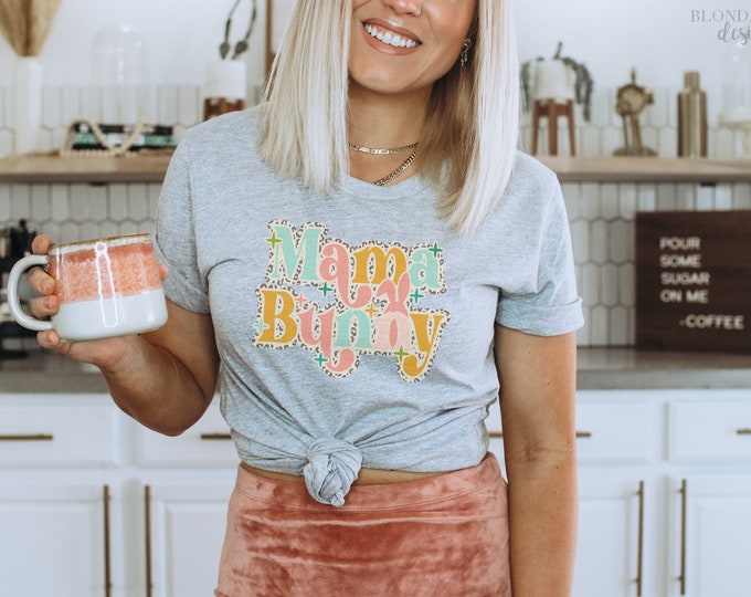 Mama Bunny Easter Shirt available in Heather gray or White with pastel graphic animal print and boho retro hippie letters