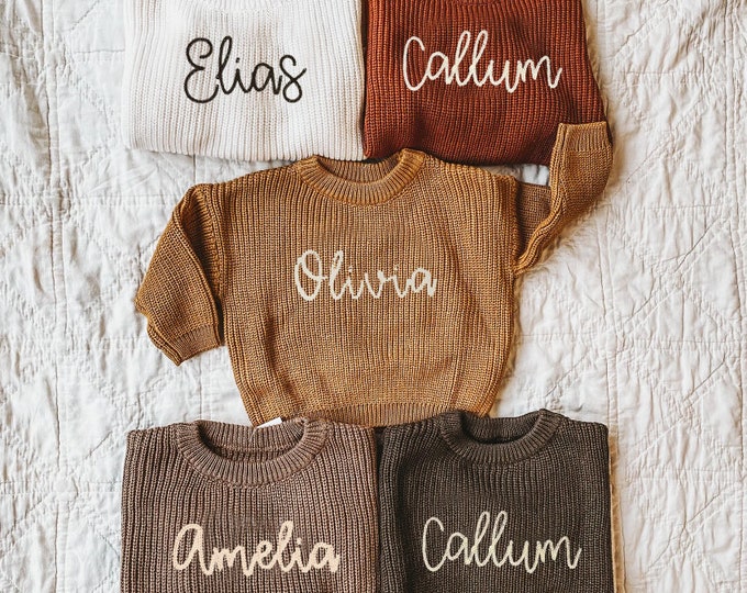 Personalized baby sweater with cursive embroidered name available in infant and toddler sizes