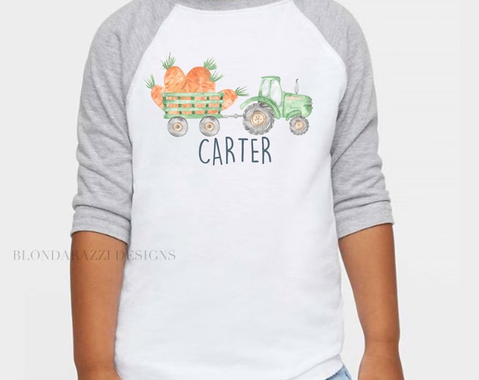 Boys Easter Shirt with graphic of a watercolor tractor hauling carrots on a trailer and personalized name