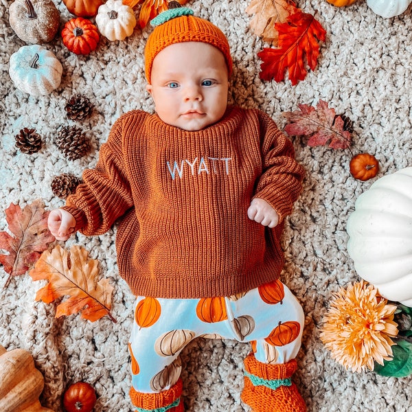 Personalized baby sweater with embroidered name available in infant and toddler sizes