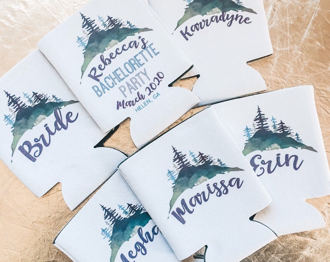 Mountain Party Can Coolers with watercolor mountains and custom blue text