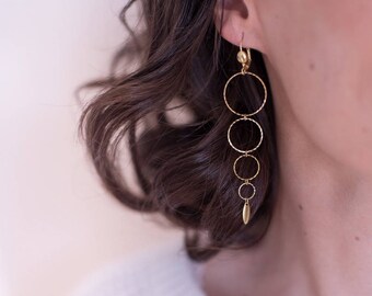 Ricochet Earrings, finely chiseled circles in raw brass