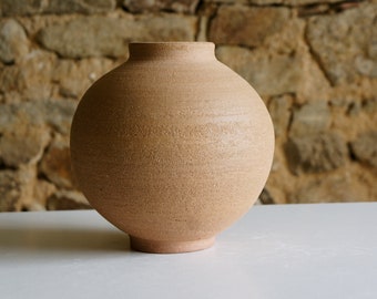 Red stoneware vase. Raw, matte ceramic vase. Ball vase.