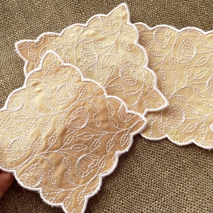Napkin with floral pattern ornament, doily coaster ITH in the hoop machine embroidery designs in assorted sizes earth nature home kitchen