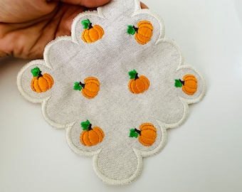 Napkin with pumpkin pattern ornament doily coaster ITH in the hoop machine embroidery designs in assorted sizes Thanksgiving farm kitchen