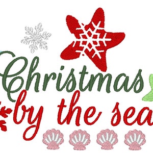 May include: Christmas by the sea embroidery design with red, green, and blue snowflakes, a red starfish with a white snowflake inside, a green starfish with a blue star inside, and pink seashells.