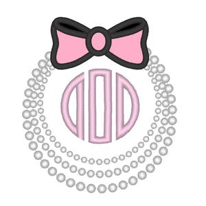 May include: A pink and black bow with a pearl necklace around a pink monogram. The monogram is a circle with three vertical lines.