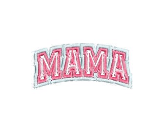 May include: A pink embroidered patch with the word "MAMA" in a stylized, arched design. The letters are in a bold, block font, outlined in white and framed by a light blue, stitched border. The patch is set against a plain white background.