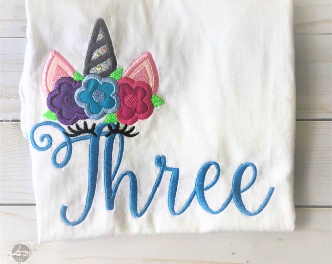 Rainbow Unicorn with flower floral crown and written Three Birthday number THREE 3 kids girl applique machine embroidery designs many sizes