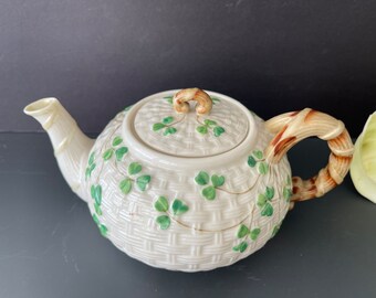 Belleek (Ireland) comports and bowls - price guide and values ANTIQUE BELLEEK IRELAND CUP and SAUCER 2nd BLACK MARK 1891-1926 Raised Flowers main image 1