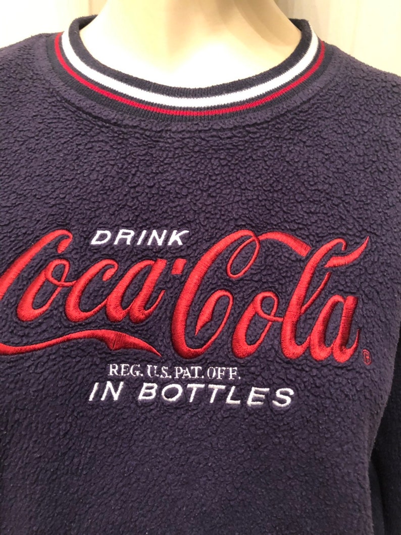 vintage Embroidered COCA COLA Brand on blue fleece Knit Jumper women sweater small pullover