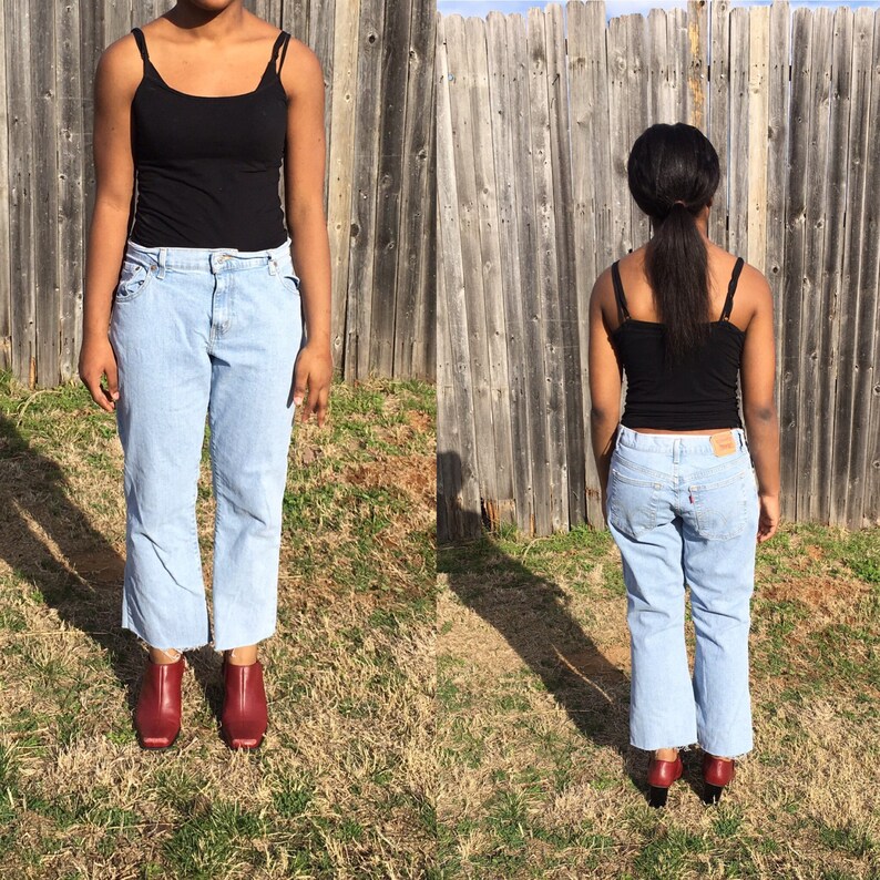 light wash frayed hem jeans
