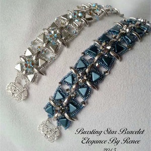 May include: Two beaded bracelets with silver accents. The top bracelet is silver and clear, while the bottom bracelet is teal and silver. Both bracelets feature a geometric design with triangular shapes.