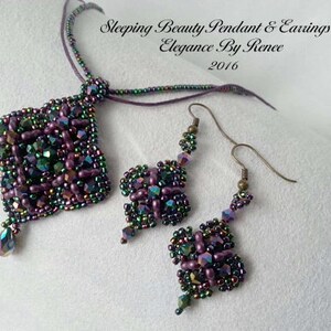 May include: A set of purple and green beaded jewelry, including a pendant and earrings. The pendant is a square shape with a teardrop-shaped bead hanging from the bottom. The earrings are both teardrop-shaped with a small flower-shaped bead at the top. The jewelry is labeled "Sleeping Beauty Pendant & Earrings Set Elegance By Renee 2016".
