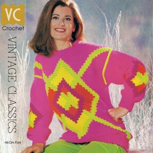 May include: A woman wearing a vibrant pink sweater featuring a geometric pattern in neon yellow and orange. The sweater has long sleeves and a ribbed hem. The text "Vintage Classics" and "Neon Fun" are visible.