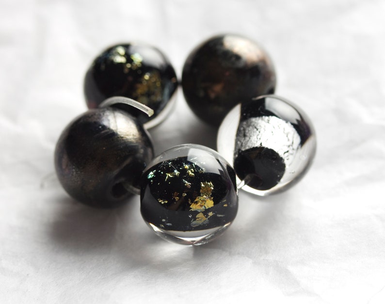 Black lampwork glass beads set for necklace bracelet and other jewelry.