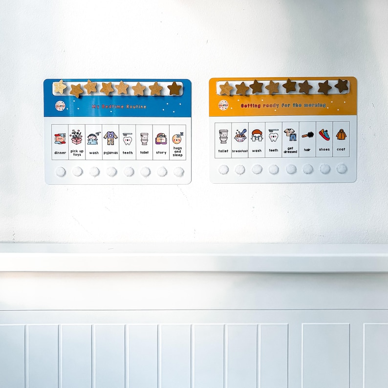 May include: Two magnetic chore charts with wooden star magnets. One chart is blue and says "My Bedtime Routine", the other is yellow and says "Getting ready for the morning". Each chart has illustrated icons and space for tasks.