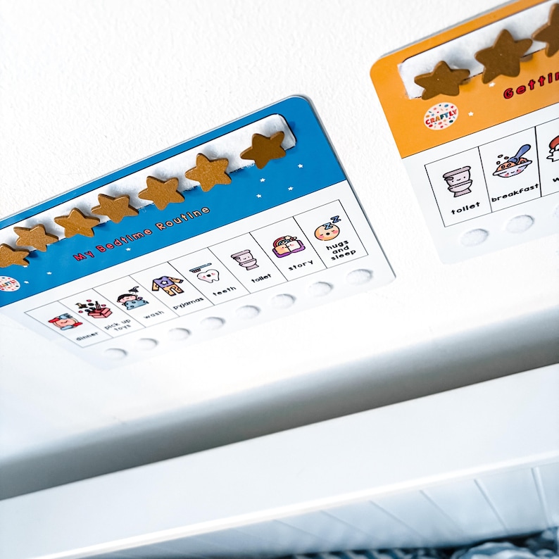 May include: Two colorful bedtime routine charts with wooden star accents. One chart is blue and labeled "My Bedtime Routine" with illustrated tasks. The other is orange and labeled "Getting Ready". Both have spaces for stars.