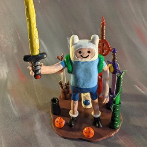 Finn the Human Inspired Sculpture with 7 Swords