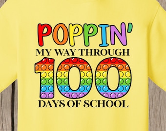 100th Day of School T Shirt. Fidget toy design.  Poppin my way through 100 days of school.  Several shirt colors available.