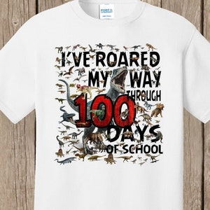 100th Day of School T Shirt 100 dinosaurs I've roared my way through 100 days of school Ships very quickly Now in gray, white, sand,red White