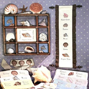 Ulotka z wzorem haftu krzyżykowego „Conch Chowder”…Country Cross Stitch…Książka 37…13 wzorów…Muszle