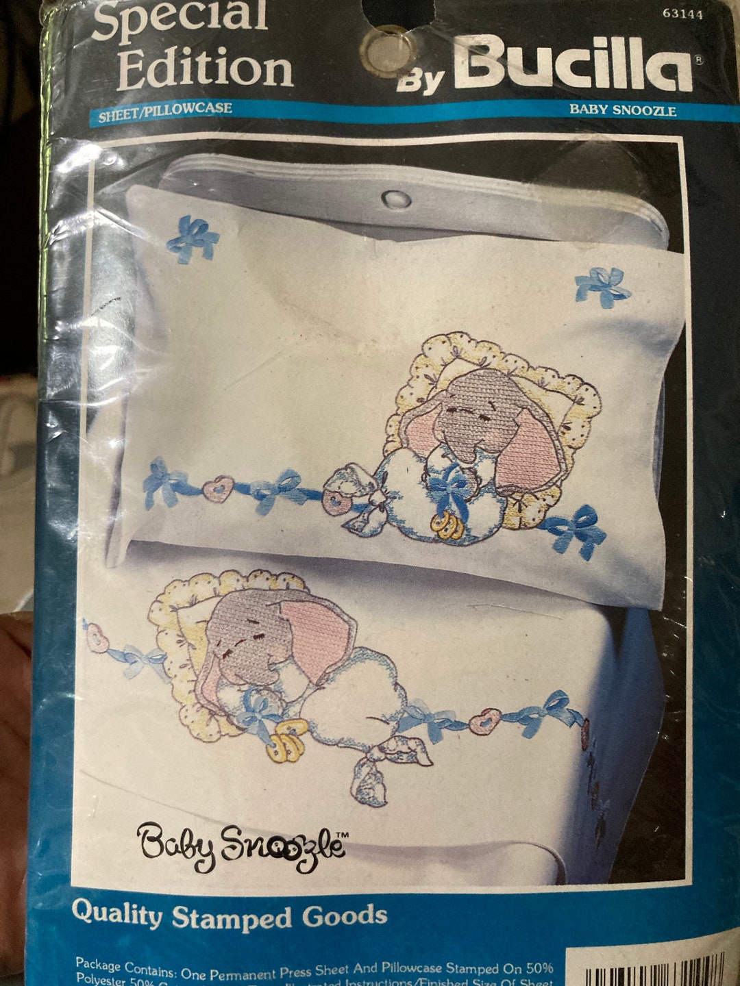Bucilla baby Snoozle Stamped Cross Stitch Kit...number 63144...sheet