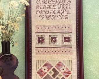Sampler Counted Cross Stitch...."Beyond The Garden Wall Sampler" Designed by Susan N Stokes...Nutmeg Needle..Leaflet 402