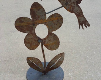 Metal hummingbird garden art